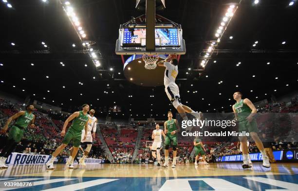 Esa Ahmad of the West Virginia Mountaineers shoots against the Marshall Thundering Herd in the second half during the second round of the 2018 NCAA...