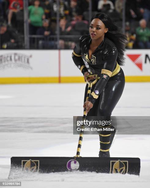 Member of the Knights Crew cleans the ice during the Vegas Golden Knights' game against the Calgary Flames at T-Mobile Arena on March 18, 2018 in Las...