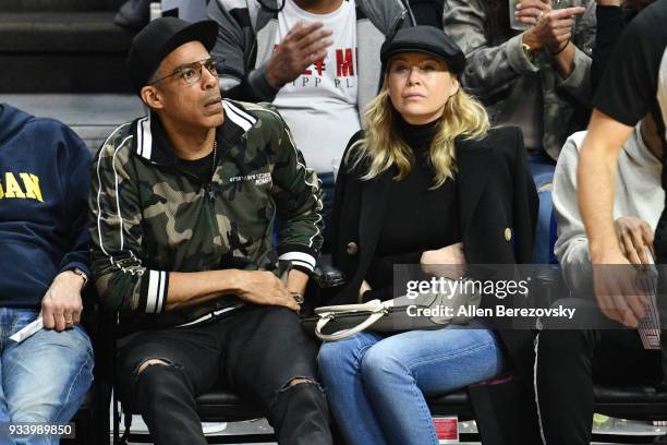 Chris Ivery and Ellen Pompeo attend a basketball game between the Los Angeles Clippers and the Portland Trail Blazers at Staples Center on March 18,...