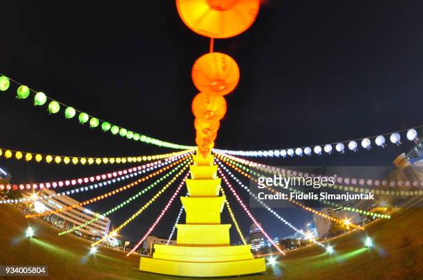 hanging colorful illuminated lanterns and pagoda at night in changwon city - south korea - changwon stock pictures, royalty-free photos & images