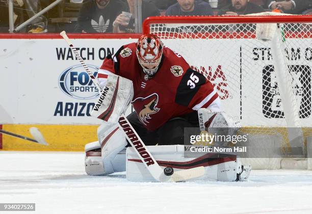 Darcy Kuemper of the Arizona Coyotes makes a stick save against the Nashville Predators at Gila River Arena on March 15, 2018 in Glendale, Arizona.