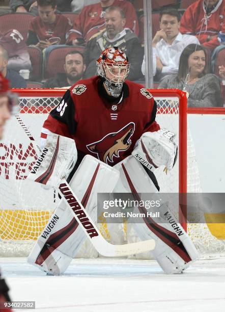 Darcy Kuemper of the Arizona Coyotes gets ready to make a save against the Nashville Predators at Gila River Arena on March 15, 2018 in Glendale,...