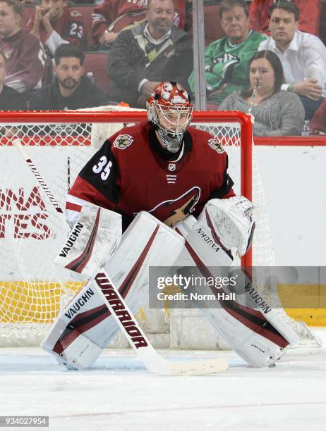 Darcy Kuemper of the Arizona Coyotes gets ready to make a save against the Nashville Predators at Gila River Arena on March 15, 2018 in Glendale,...