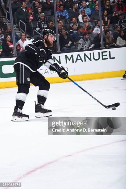 Jake Muzzin of the Los Angeles Kings handles the puck during a game against the Detroit Red Wings at STAPLES Center on March 15, 2018 in Los Angeles,...
