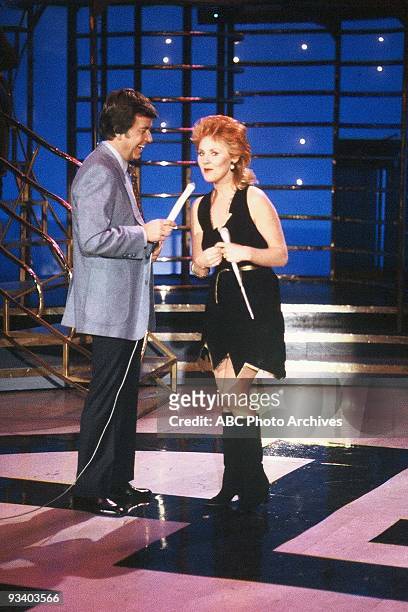 Dick Clark talks with British singer Lulu on American Bandstand.,