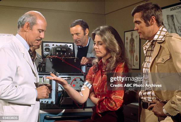 Season Two - 3/16/75, Pictured, from left: Alan Oppenheimer , Richard Anderson (, Lindsay Wagner , Lee Majors ,
