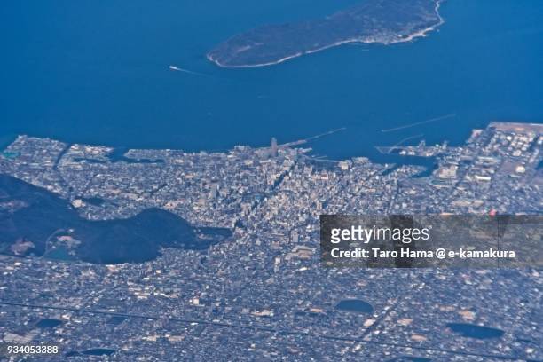 seto inland sea and takamatsu city in kagawa prefecture in japan daytime aerial view from airplane - 高松市 ストックフォトと画像