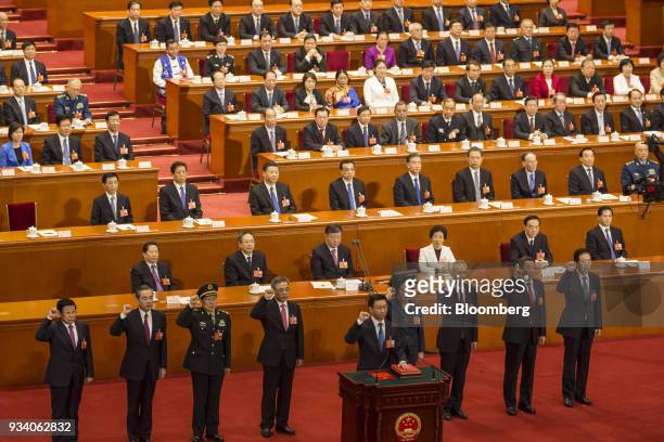Zhao Kezhi, China's state councilor, front row from left to right, Wang Yi, China's foreign minister, Wei Fenghe, China's national defense minister,...