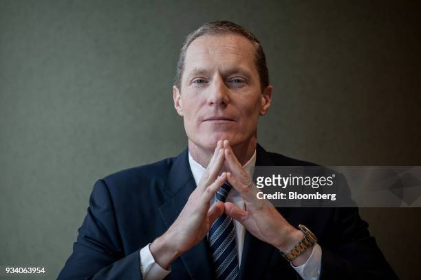 Woody Bradford, chairman and chief executive officer of Conning & Co., poses for a photograph following a Bloomberg Television in Hong Kong, China,...