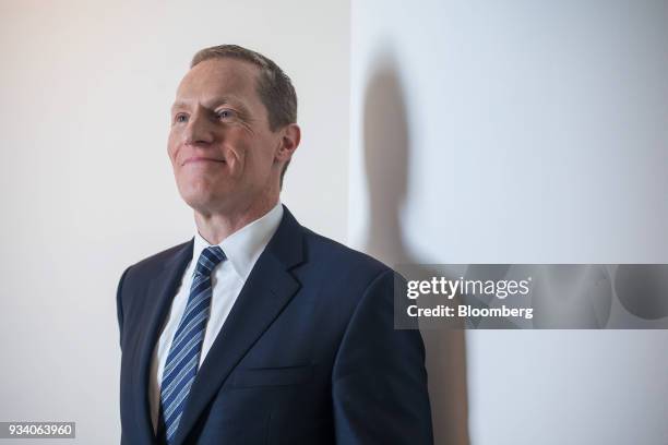 Woody Bradford, chairman and chief executive officer of Conning & Co., poses for a photograph ahead of a Bloomberg Television in Hong Kong, China, on...