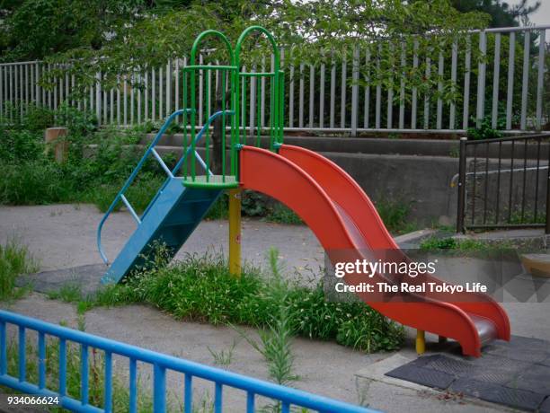 slide - playground equipment stock pictures, royalty-free photos & images