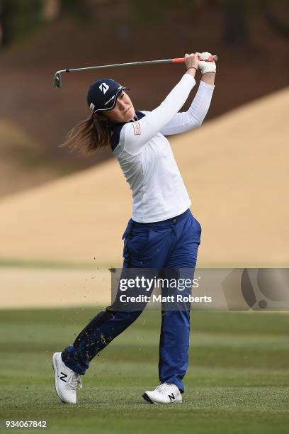 Ayaka Watanabe of Japan plays her second shot on the 1st hole during the final round of the T-Point Ladies Golf Tournament at the Ibaraki Kokusai...