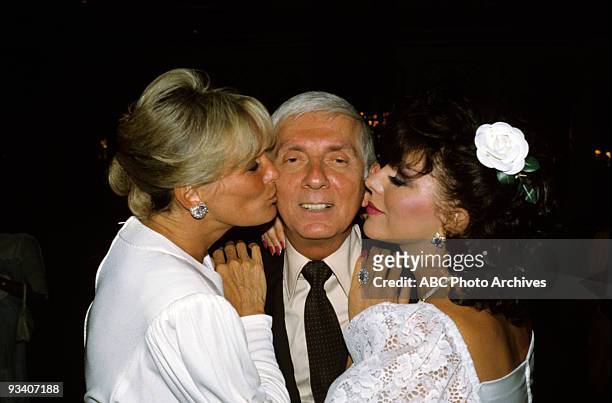 Walt Disney Television via Getty Images Press Tour/Salute to Aaron Spelling - 6/20/84, "Dynasty" stars Linda Evans and Joan Collins joined executive...