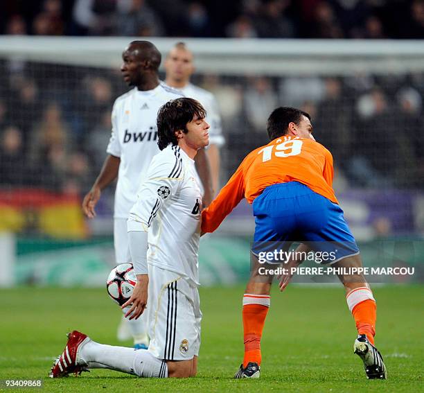 Real Madrid's Brazilian midfielder Kaka reacts after clashing with Zurich's defender and captain Alain Rochat during their UEFA Champions League...