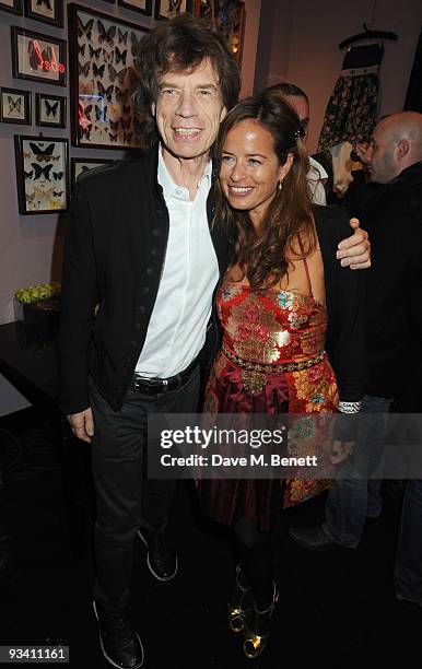 Mick and Jade Jagger attend the Jade Jagger shop opening party on November 25, 2009 in London, England.