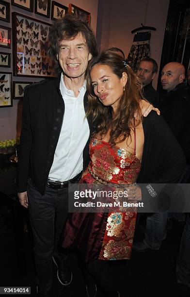 Mick and Jade Jagger attend the Jade Jagger shop opening party on November 25, 2009 in London, England.