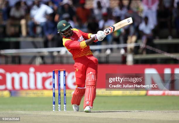 Solomon Mire of Zimbabwe hits out during The Cricket World Cup Qualifier between The West Indies and Zimbabwe at The Harare Sports Club on March 19,...