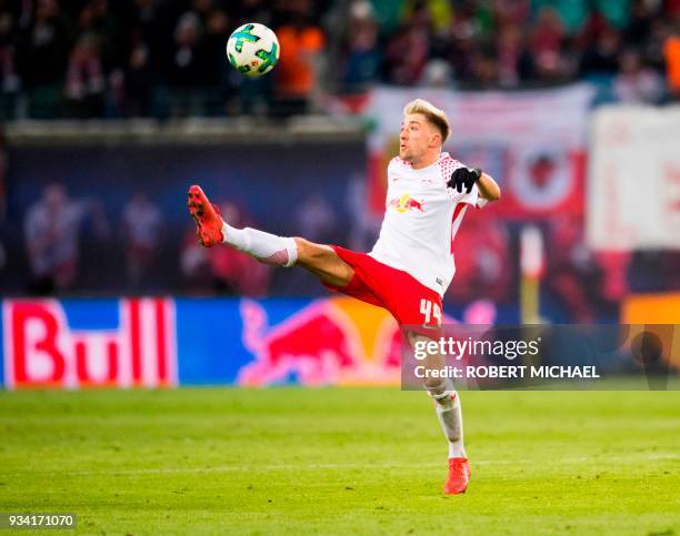 Leipzig's Slovanian midfielder Kevin Kampl plays the ball during the German first division Bundesliga football match between RB Leipzig and FC Bayern...