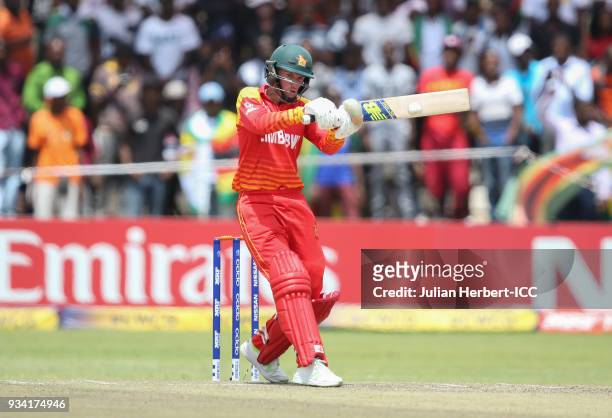 Sean Williams of Zimbabwe hits out during The Cricket World Cup Qualifier between The West Indies and Zimbabwe at The Harare Sports Club on March 19,...