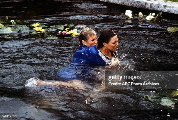 The Threat" - Season Three - 4/13/83, Krystle and Alexis's argument about Fallon resulted in a brawl in the Carrington lily pond.,