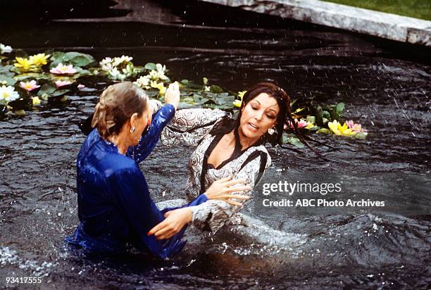 The Threat" - Season Three - 4/13/83, Krystle and Alexis's argument about Fallon resulted in a brawl in the Carrington lily pond.,