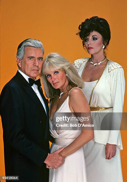 Portrait of, from left, actors John Forsythe , Linda Evans , and Joan Collins from the television show 'Dynasty,' Los Angeles, California, November...