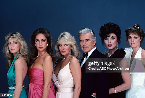 Portrait of, from left: Heather Locklear , Pamela Bellwood , Linda Evans , John Forsythe , Joan Collins , and Pamela Sue Martin , from the television...