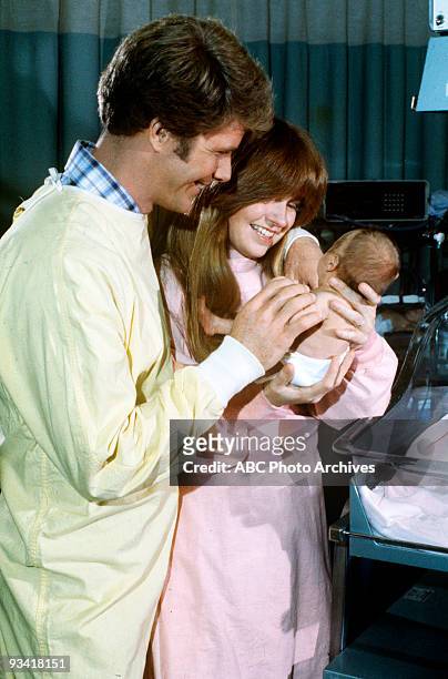 And Baby Makes Nine" - Season Five -, 10/29/80, Merle and Susan celebrated the birth of their daughter, Sandra Sue, the first Bradford grandchild.,