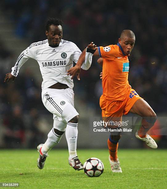 Michael Essien of Chelsea battles with Alvaro Pereira of FC Porto during the UEFA Champions League Group D match between FC Porto and Chelsea at the...