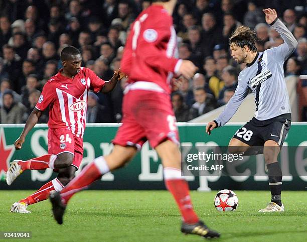 Turin's midfielder Diego vies with Bordeaux's midfielder Abdou Traore during their Champions League football match Bordeaux versus Juventus of Turin...