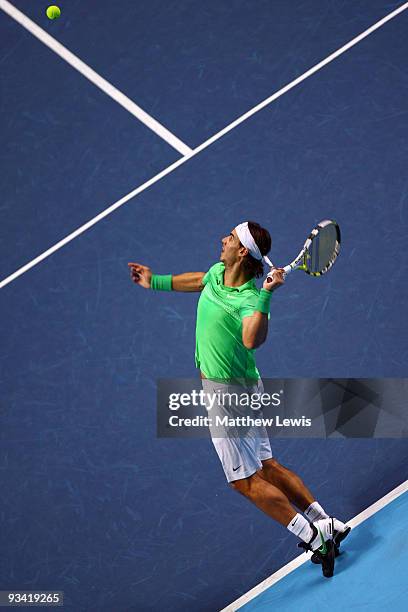 Rafael Nadal of Spain serves the ball during the men's singles first round match against Nikolay Davydenko of Russia during the Barclays ATP World...