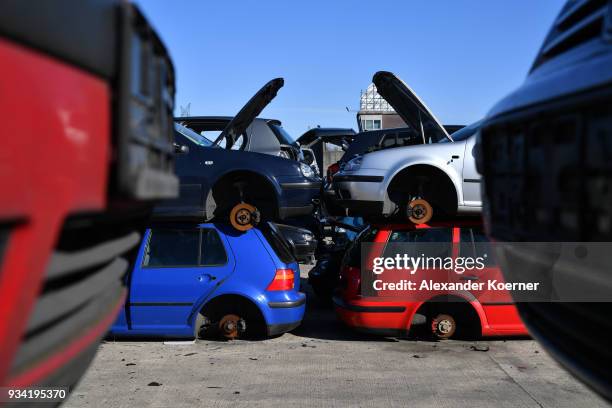 Volkswagen Passat and Golf cars stand at a scrap yard on March 19, 2018 in Hamburg, Germany. Diesel car owners in Germany are fearing the value of...