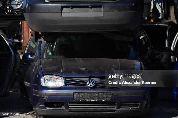 Crushed cars, including Audi and Volkswagen diesel EURO 4 cars stand crushed at a scrap yard on March 19, 2018 in Hamburg, Germany. Diesel car owners...