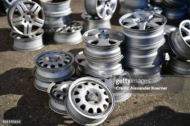 Rims for Volkswagen and Audi cars are displayed at a scrap yard on March 19, 2018 in Hamburg, Germany. Diesel car owners in Germany are fearing the...