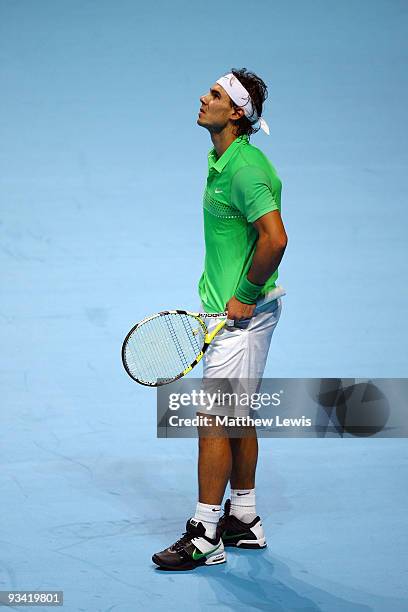 Rafael Nadal of Spain reacts during the men's singles first round match against Nikolay Davydenko of Russia during the Barclays ATP World Tour Finals...