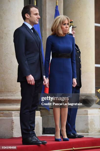 French President Emmanuel Macron and Brigitte Macron pose in the courtyard of Elysee Palace on March 19, 2018 in Paris, France. Grand-Duke Henri Of...