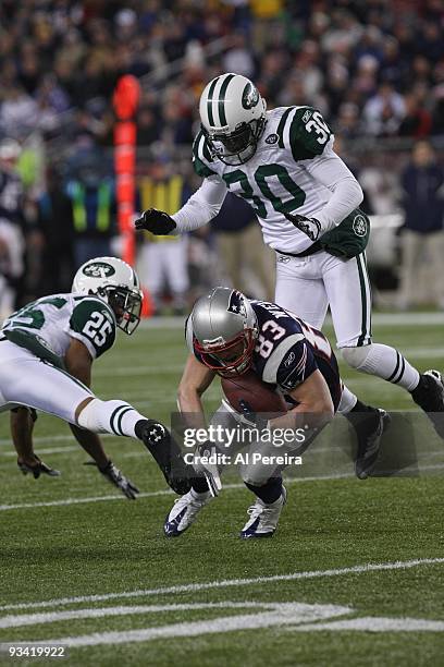 Wide Receiver Wes Welker of the New England Patriots has a long gain against the New York Jets when the New England Patriots host the New York Jets...