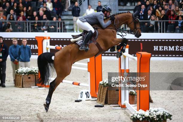 Philipp WEISHAUPT and Call ma Eva competes in the Prix du 24 Faubourg CSI5* of Le Saut Hermes 2018 at Grand Palais on March 17, 2018 in Paris, France.