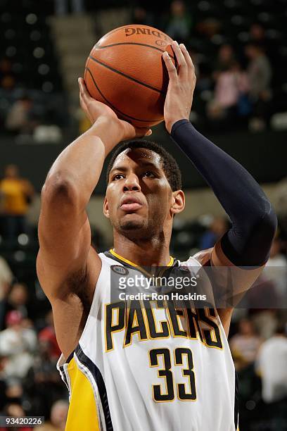 Danny Granger of the Indiana Pacers shoots a free throw during the game against the Golden State Warriors on November 11, 2009 at Conseco Fieldhouse...