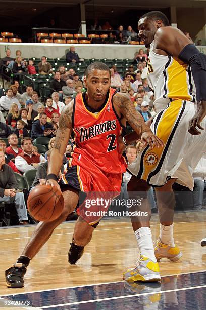 Acie Law of the Golden State Warriors drives to the basket against Roy Hibbert of the Indiana Pacers during the game on November 11, 2009 at Conseco...