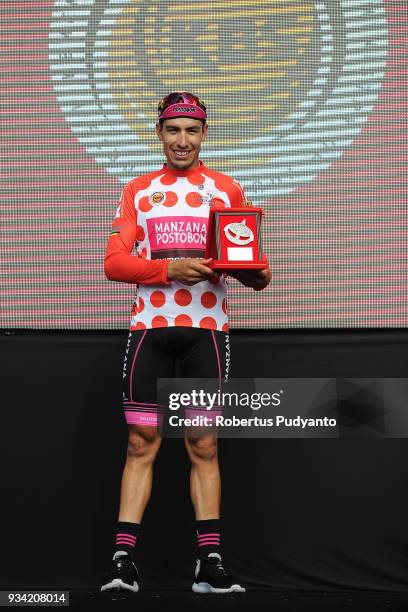 Red Polka Dot jersey winner Bernardo Albeiro Suaza Arango of Manzana Postobon Team Columbia celebrates on the podium during Stage 2 of the Le Tour de...