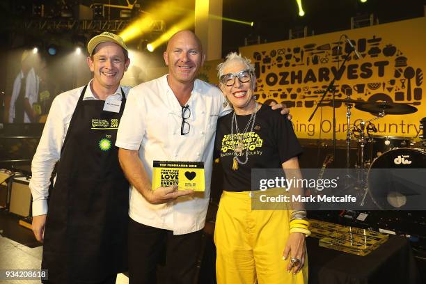Ronni Kahn CEO and founder of OzHarvest poses with Chef Matt Moran and Richard Deutsch of Deloitte during the Oz Harvest CEO Cookoff on March 19,...