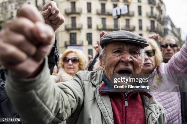 Protester raises his fist on Roger de Lluria street during the 'Marea Pensionista' demonstration for pension reform in Barcelona, Spain, on Saturday,...
