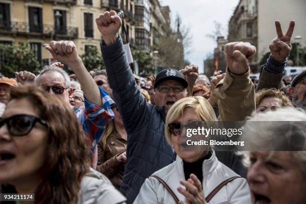 Protester raises his fist during the 'Marea Pensionista' demonstration for pension reform in Barcelona, Spain, on Saturday, March 17, 2017. As Spain...
