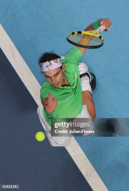 Rafael Nadal of Spain serves during the men's singles first round match against Nikolay Davydenko of Russia during the Barclays ATP World Tour Finals...