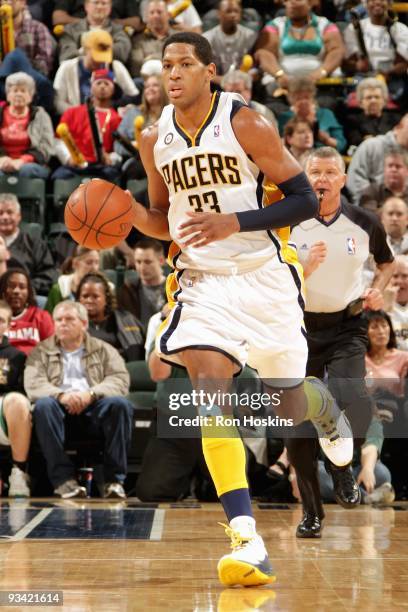 Danny Granger of the Indiana Pacers brings the ball upcourt against the New York Knicks during the game on November 18, 2009 at Conseco Fieldhouse in...