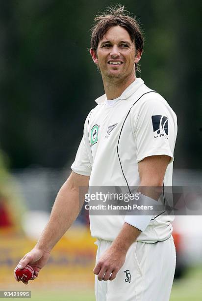 Shane Bond of New Zealand walks back to his mark during day three of the First Test match between New Zealand and Pakistan at University Oval on...
