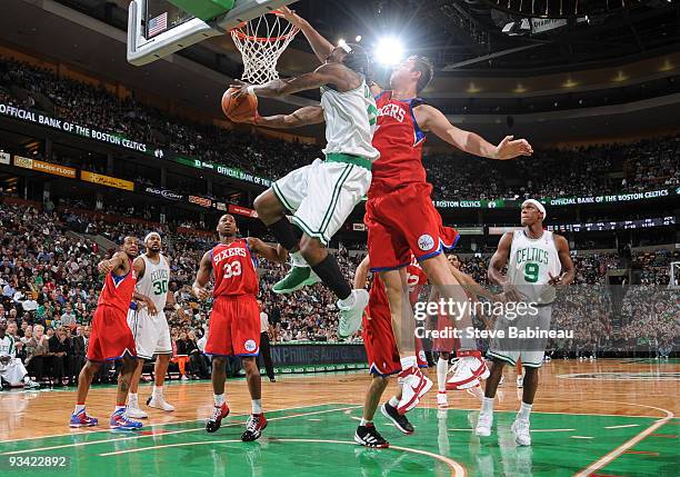 Marquis Daniels of the Boston Celtics goes for a layup against Primoz Brezec of the Philadelphia 76ers on November 25, 2009 at the TD Garden in...