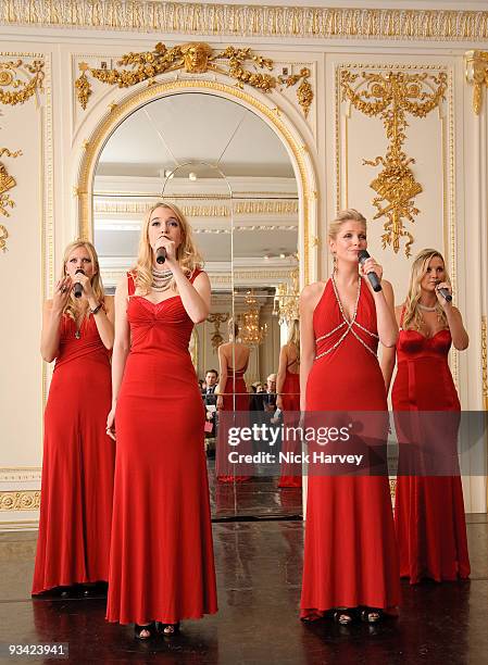 Singing group Passionata, consisting of Cecelia de Lisle, Amelia Knight, Ellie Laugharne and Sophie Elliott attends photocall to switch on...