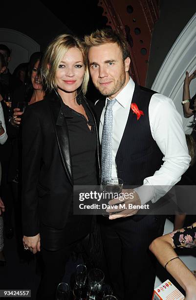 Model Kate Moss and singer Gary Barlow attend the SingStar Take That Extravaganza at the Tabernacle on November 25, 2009 in London, England.